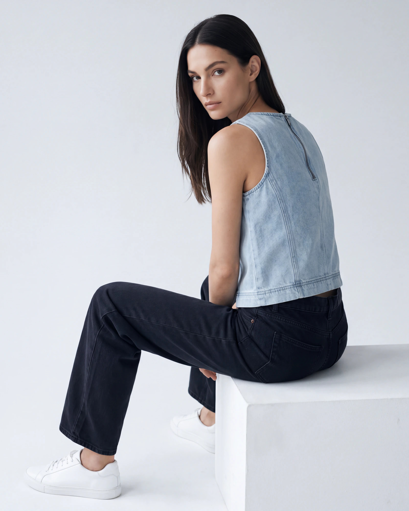 AI-generated on-model photograph of a denim top, produced by Nokkh from flat product images